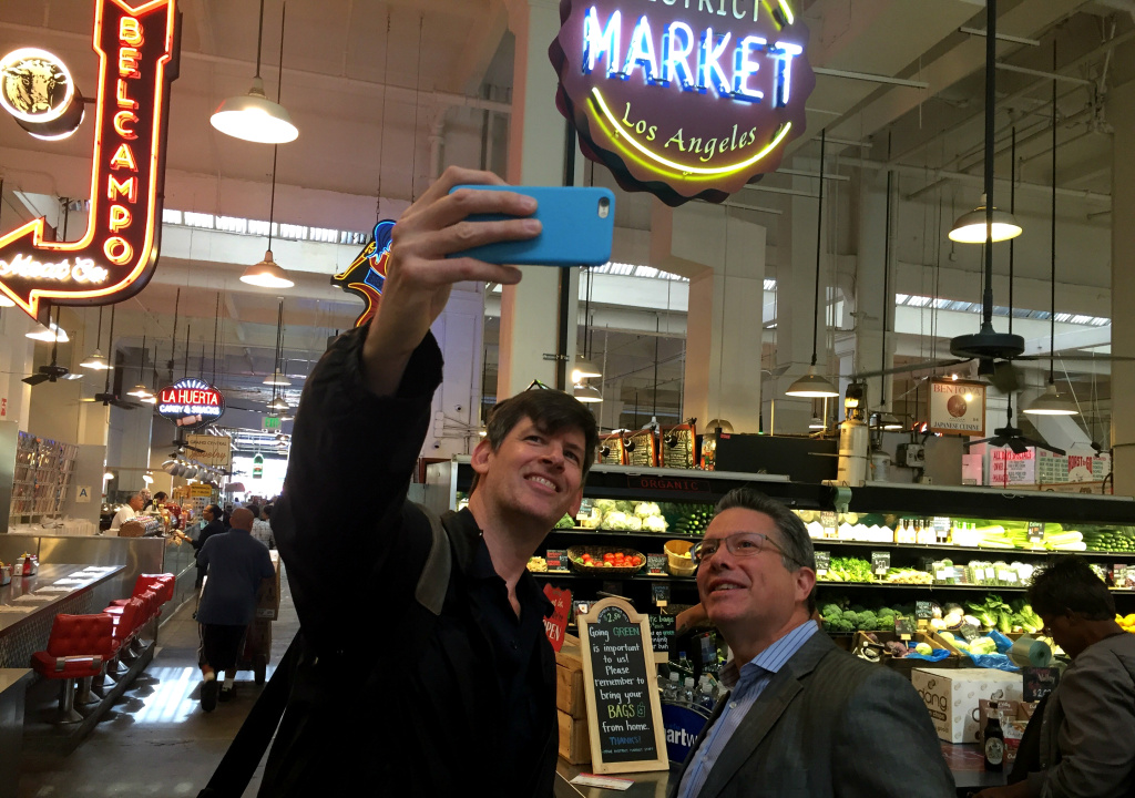 KPCC's John Rabe and reporter Jesse Katz inside LA's Grand Central Market. Jesse's article in the October issue of Los Angeles Magazine covers the market's huge debt, as well as a major discrimination lawsuit. KPCC's John Rabe and reporter Jesse Katz inside LA's Grand Central Market. Jesse's article in the October issue of Los Angeles Magazine covers the market's huge debt, as well as a major discrimination lawsuit.