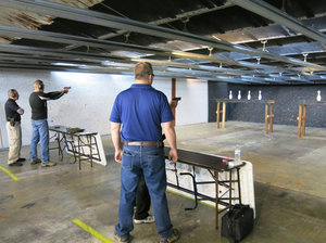 daley-pic-2-firing_range_edited_custom-1847607278734f8c1911ab9d170d090f4407d745-s300-c85.jpg Shooters take aim on Monday Night Bowling Pin Shoot at the firing range of the Bristlecone Shooting, Training and Retail Center in Lakewood, Colo.