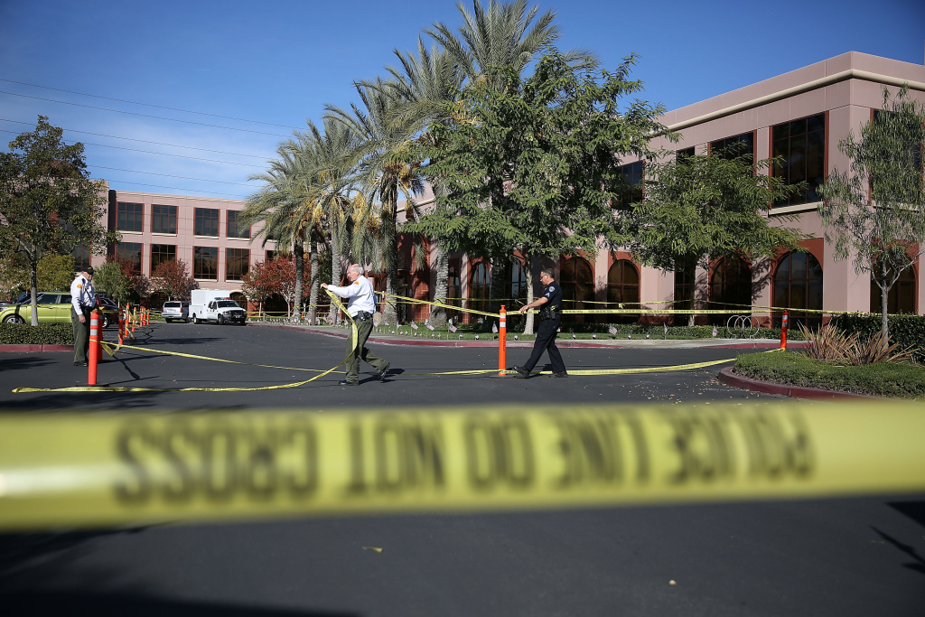 Community Mourns As Investigation Continues Into San Bernardino Mass Shooting File: Officials put up police tape in front of the building at the Inland Regional Center were 14 people were killed on Dec. 7, 2015 in San Bernardino.