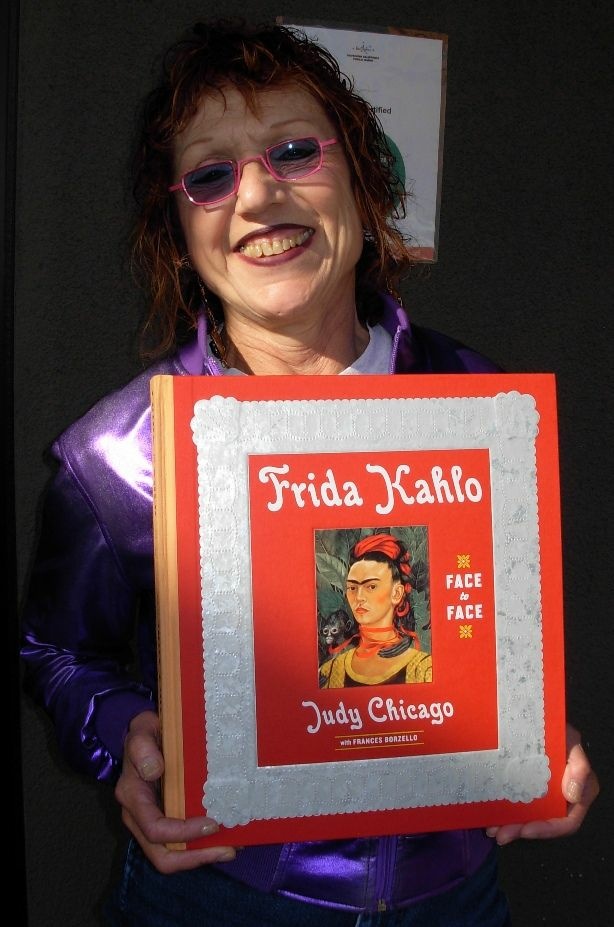 Mercer 12850 Artist Judy Chicago and her book.
