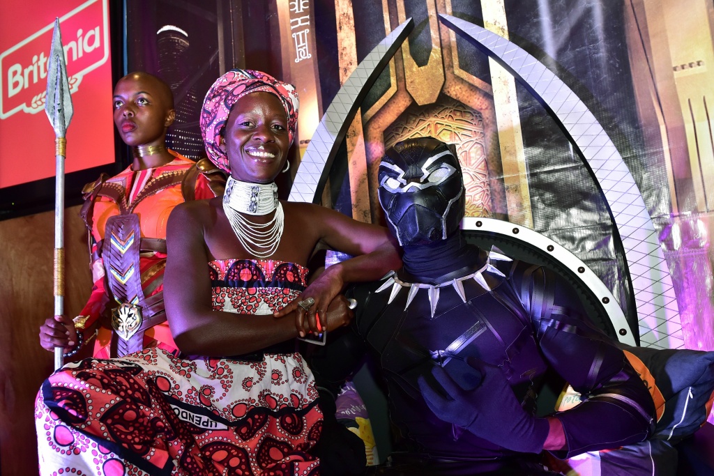 KENYA-US-ARTS-CINEMA Zawadi Nyong'o, older sister of Oscar winning Kenyan actress Lupita Nyong'o, poses with a cosplayer dressed up for