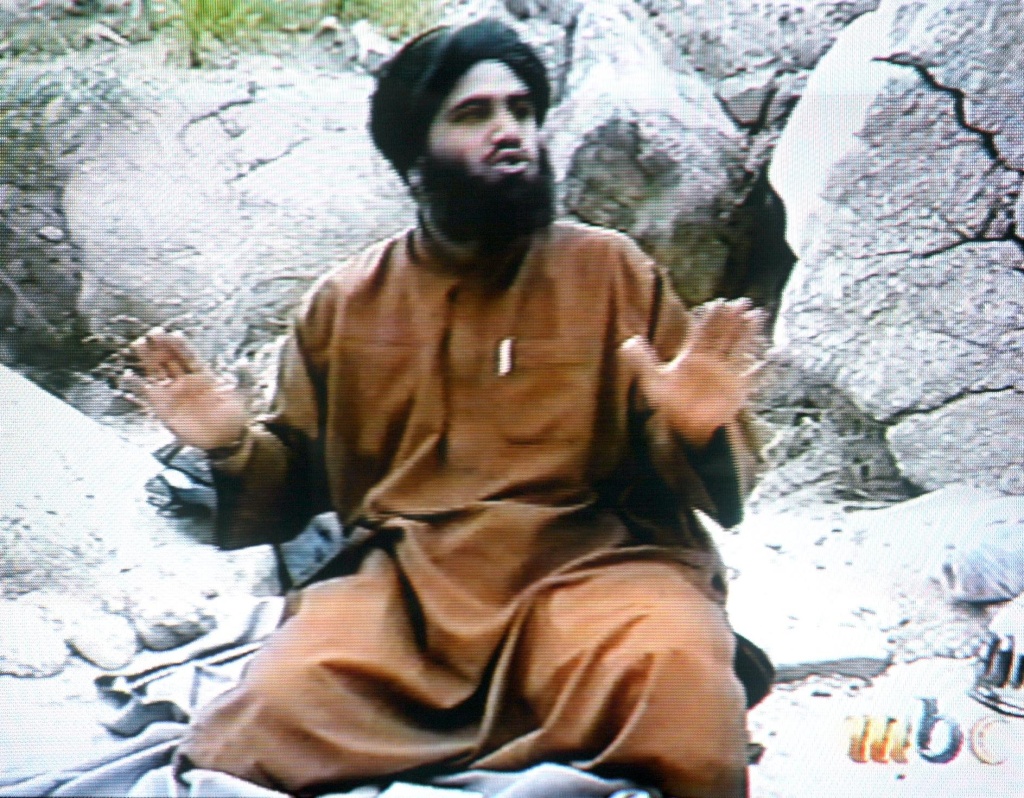 This frame grab from the Saudi-owned television network MBC (Middle East Broadcasting Center) shows Suleiman Abu Ghaith, the spokesman of alleged terror mastermind Osama bin Laden's al-Qaeda network, claiming responsibility for the September 11 suicide attacks in the United States in an undated videotape broadcast by the Dubai-based MBC 17 April 2002.
