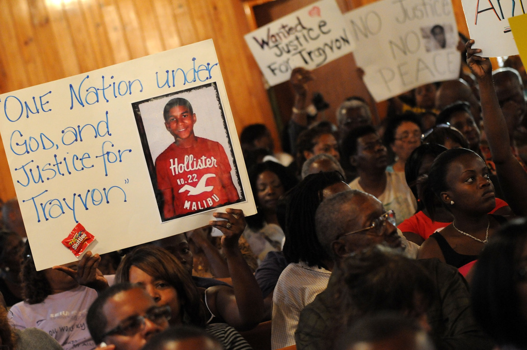 Federal Government To Investigate Shooting Of Unarmed Teen Trayvon Martin Civil rights leaders and residents of the city of Sanford attend to a town hall meeting to discuss the death of a 17-year-old unarmed black teen Trayvon Martin who was shot by a neighborhood watch captain on March 20, 2012 in Sanford, Florida.