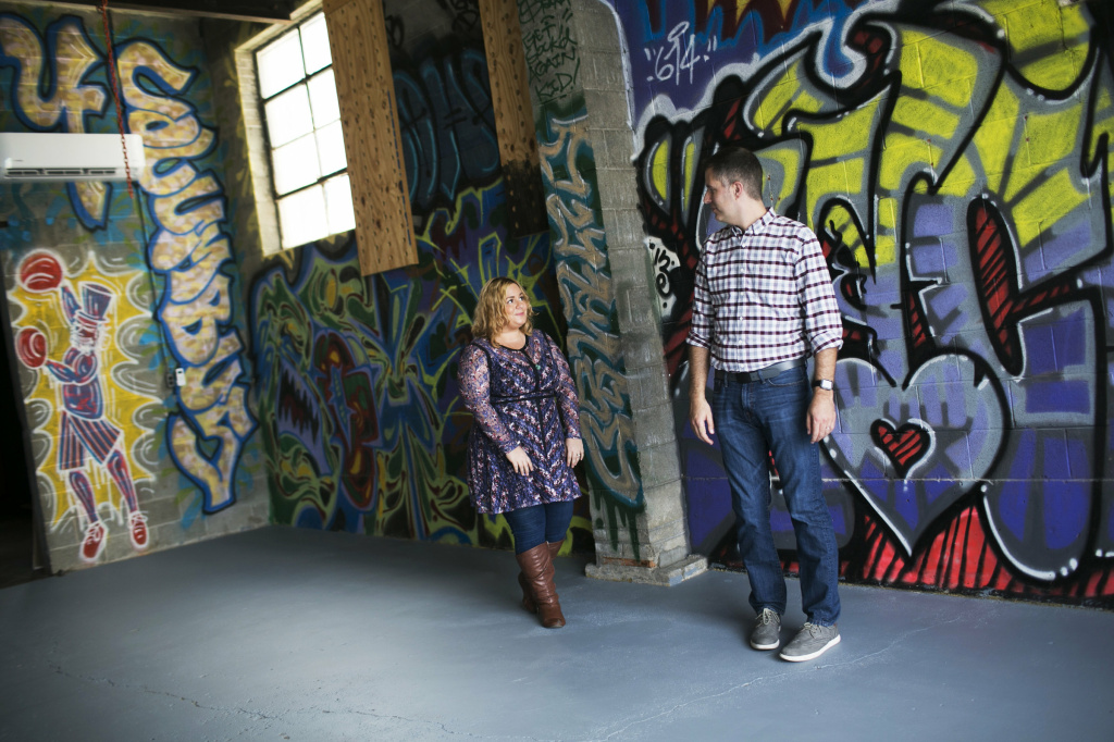 ohio nation engaged Tara DeFrancisco and Rance Rizzutto walk around their new comedy space in downtown Columbus. The newlyweds are recent transplants from Chicago and are opening a comedy theater.