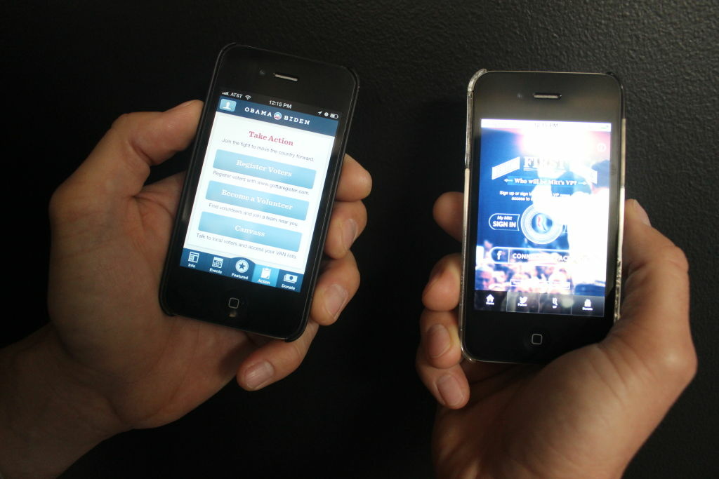 A Patt Morrison producer displays Mitt Romney's and Barack Obama's apps on iPhones A Patt Morrison producer displays Mitt Romney's and Barack Obama's apps on iPhones.