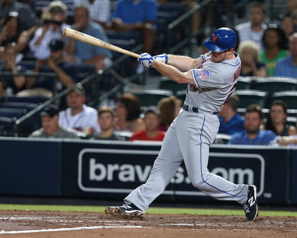 New York Mets v Atlanta Braves Second baseman Daniel Murphy #28 of the New York Mets follows through on a swing for a sixth inning RBI single during the game against the Atlanta Braves at Turner Field on September 3, 2013 in Atlanta, Georgia.