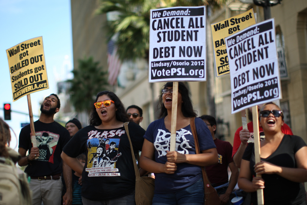 Activist Demonstrate Against High Cost Of College Education In U.S. Students protest the rising costs of student loans for higher education