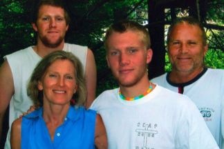 Jan and Linton Weeks with their sons Holt (second from right) and Stone (left) who both were killed in a car crash a year ago.