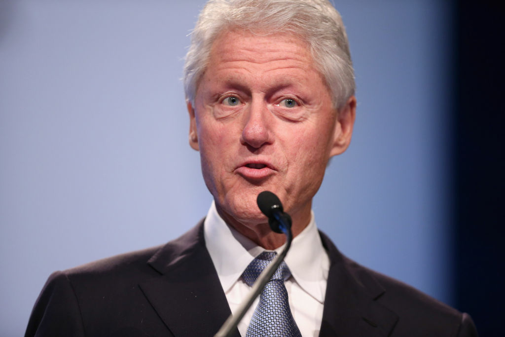 Former President Bill Clinton Gives Closing Remarks At The Int'l AIDS Conference Former U.S. President Bill Clinton delivers closing remarks at the International AIDS Conference at the Walter Washington Convention Center July 27, 2012 in Washington, DC. This is the 19th annual international gathering of 'policy makers, persons living with HIV and other individuals committed to ending the pandemic.' Leaders in the fight against HIV/AIDS -- including Bill Gates, UNAIDS Executive Director Michel Sidibé, Elton John and U.S. Secretary of State Hillary Rodham Clinton -- also addressed the conference.