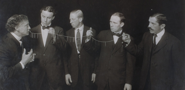 Mercer 17518 Houdini (L) performs his famous needle and thread trick.