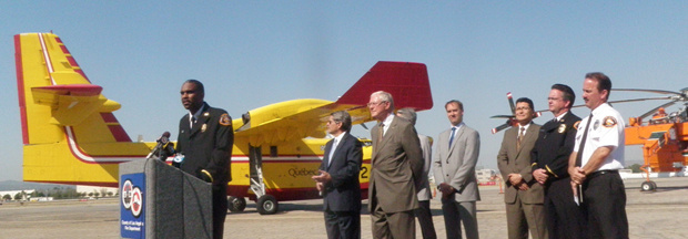 LA County Fire Department Chief Daryl Osby and County leaders gathered to speak about their three-month agreement to lease two Candian Super Scooper aircrafts and a heli-tanker to fight fires.