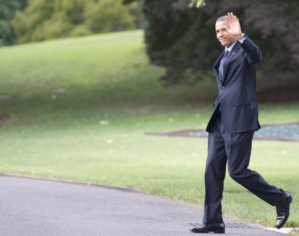 President Obama Speaks On The Economy At Knox College President Barack Obama waves to the press pool as he prepares to depart the South Lawn of the White House July 24, 2013in Washington, DC. The President plans to deliver speeches in Galesburg, Illinois and Warrensburg, Missouri.