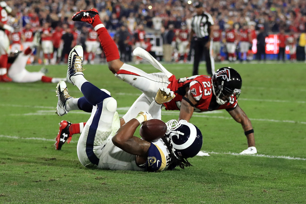 Wild Card Round - Atlanta Falcons v Los Angeles Rams LOS ANGELES, CA - JANUARY 06: Todd Gurley #30 of the Los Angeles Rams fails to complete a catch during first half of the NFC Wild Card Playoff Game against the Atlanta Falcons at the Los Angeles Coliseum on January 6, 2018 in Los Angeles, California. (Photo by Sean M. Haffey/Getty Images)