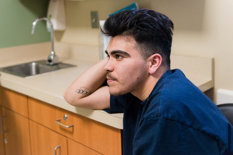 Steven Amador, 18, waits in the exam room with fiancée Serenity Thomason. Amador said he feels lucky he hasn’t contracted an STD. Steven Amador, 18, waits in the exam room with fiancée Serenity Thomason. Amador said he feels lucky he hasn’t contracted an STD.