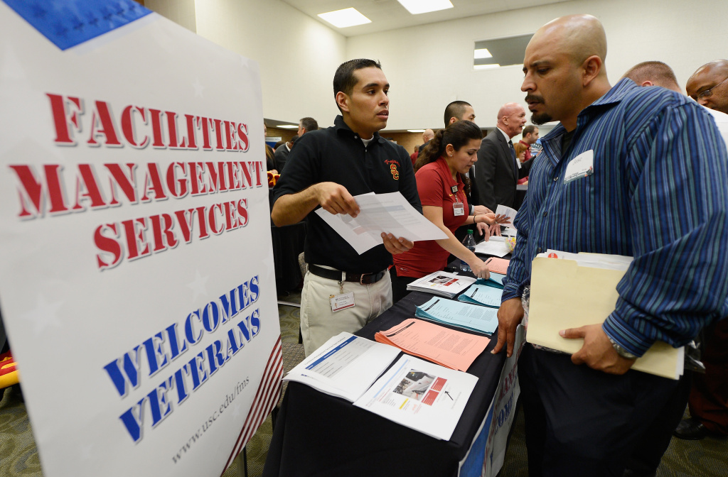 California Unemployment Tied For Highest In U.S. At 9.8 Percent U.S. Marine Corps veteran Jose Navarrete (R) listens to Brian Mendez with University of Southern California facilities management services as he looks for employment during a jobs fair for veterans called