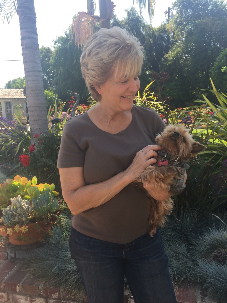 Donna Perez with her pet Yorkie, Cody. Her other dog was killed by a coyote in her backyard last fall.