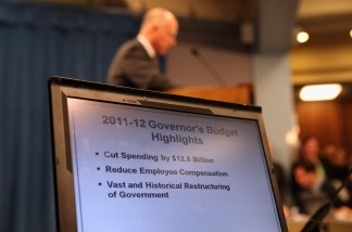 A laptop shows highlights of California Governor Jerry Brown's proposed budget during a press conference at the State Capitol on January 10, 2011 in Sacramento, California.