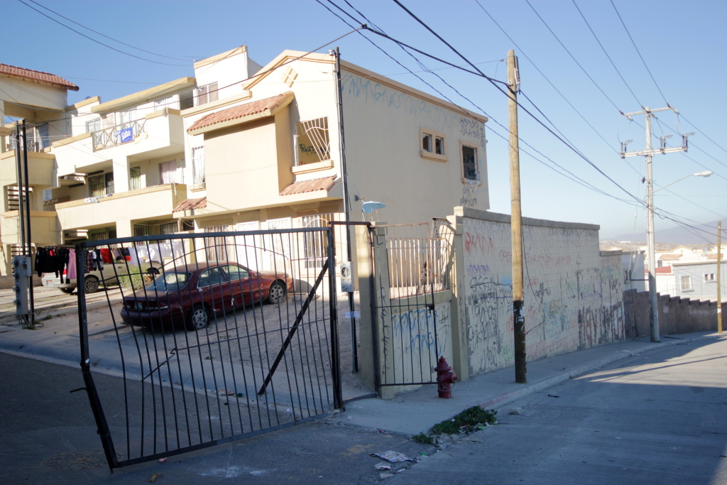 Fronteras Gated streets in neighborhoods like Villa del Prado were marketed for their exclusivity and safety. Here they haven't escaped vandalism.