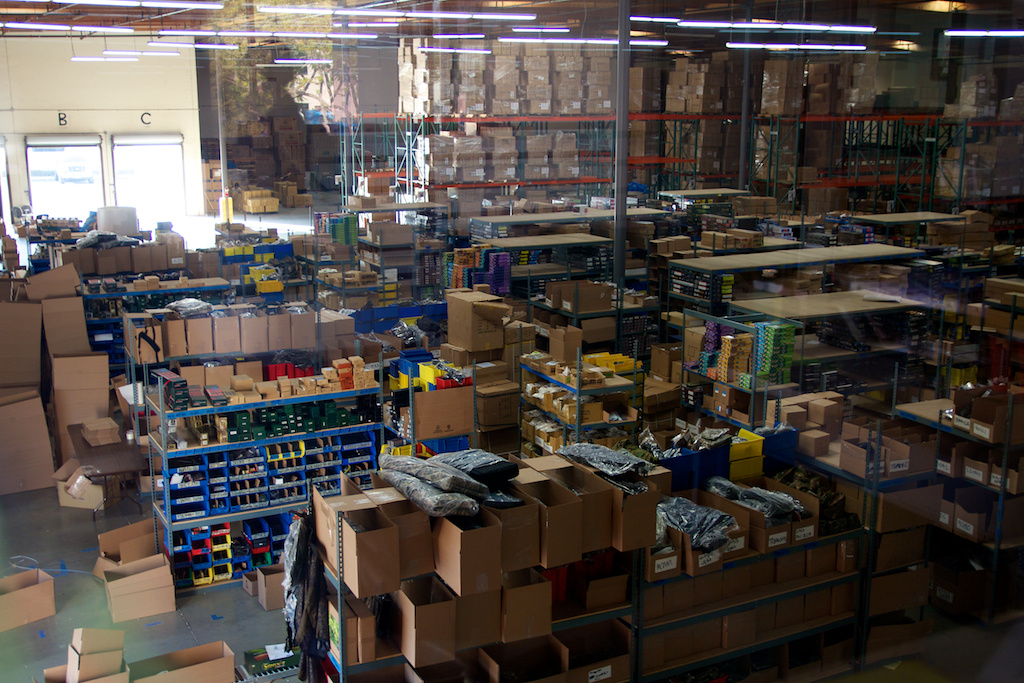 U.S. companies restocked their store shelves and warehouses at a slower pace in December, a sign of caution as sales weakened. Slower restocking was a major drag on the economy in the final three months of last year. Slower rebuilding of inventories means factories produced less, lowering overall economic output. (A wide view of the AirSplat warehouse in Calif.)