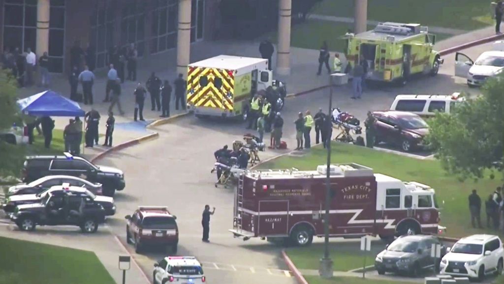 School Shooting-Texas In this image taken from video emergency personnel and law enforcement officers respond to a high school near Houston after an active shooter was reported on campus, Friday, May 18, 2018, in Santa Fe, Texas.