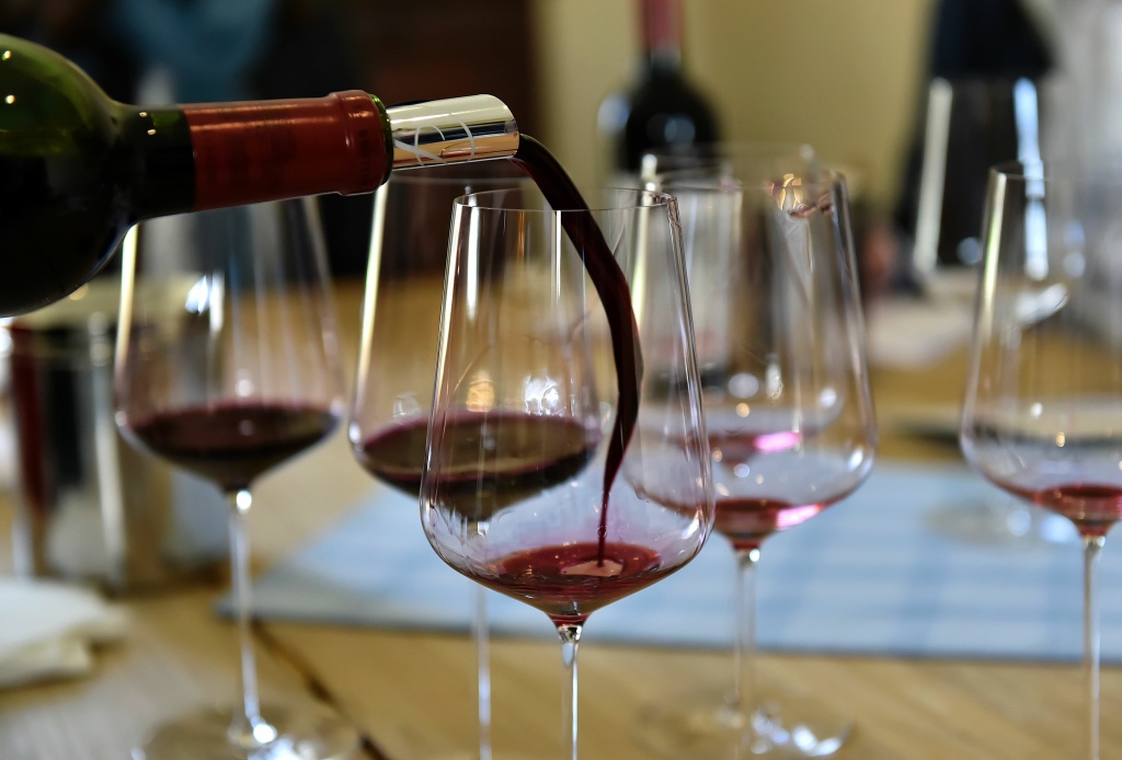Wine is poured during a tasting of the 2016 vintage Bordeaux primeurs at Chateau La Lagune in Ludon-Medoc on April 4, 2017. Wine is poured during a tasting of the 2016 vintage Bordeaux primeurs at Chateau La Lagune in Ludon-Medoc on April 4, 2017.