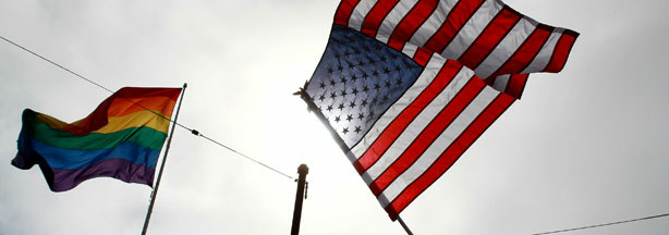 An opponent of Prop 8 waves an American flag during a rally to celebrate the ruling to overturn Prop 8 on Aug. 4, 2010 in San Francisco, California.
