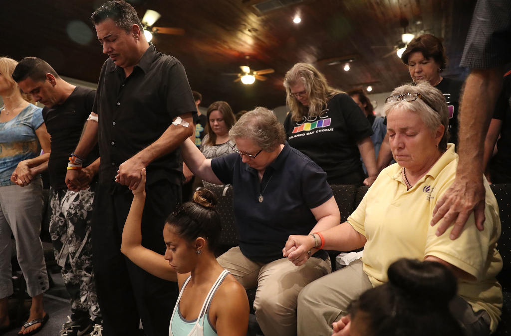 On the afternoon after a deadly attack on a nightclub in Orlando, Fla., a man who says he was wounded in the violence was among those attending a memorial service at the Joy MCC Church. Police say a lone gunman killed 49 people in the attack. On the afternoon after a deadly attack on a nightclub in Orlando, Fla., a man who says he was wounded in the violence was among those attending a memorial service at the Joy MCC Church. Police say a lone gunman killed 49 people in the attack.