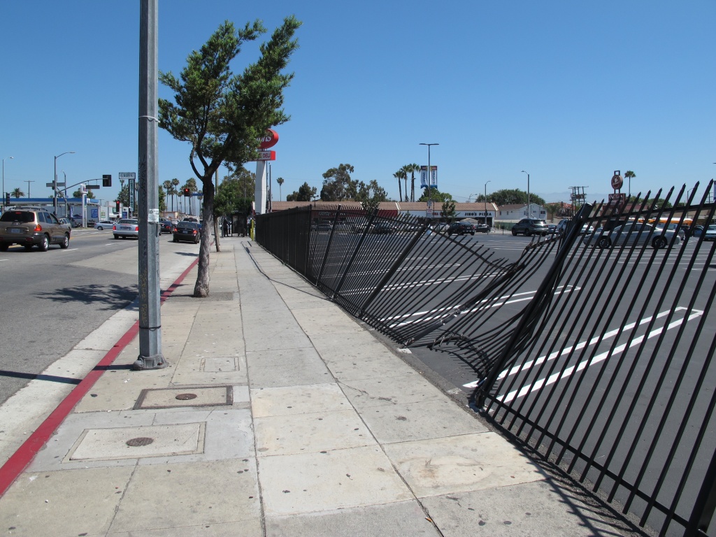 Vision Zero South LA 3 Iron fences like these are a regular feature in South L.A. to protect businesses from car crashes, but this one was mangled in a recent collision on Western Avenue near Manchester Avenue.