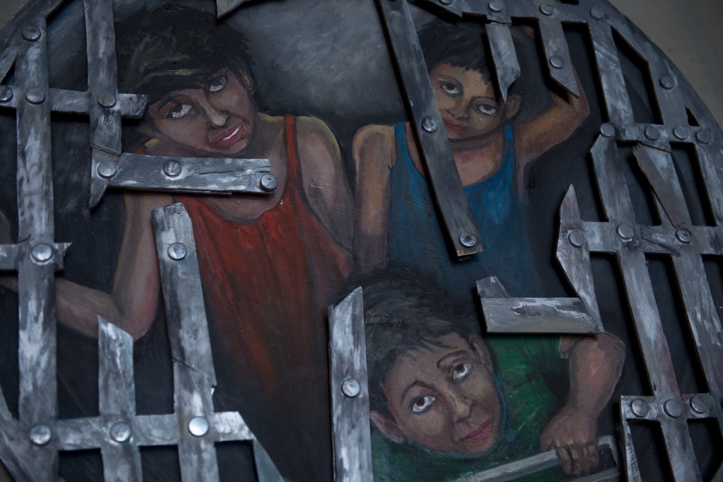 A painting named A painting named 'The Forgotten' by Debora Prum is exposed during the opening ceremony of the 'Hunger Free' exhibition promoted by World Vision organization on June 15, 2012 in Cabo San Lucas, state of Baja California Sur Mexico. The June 18-19 summit of the Group of Twenty (G20) major economies in the Mexican resort of Los Cabos is expected to be dominated by discussions on resolving the eurozone's crippling debt crisis and restoring global growth.