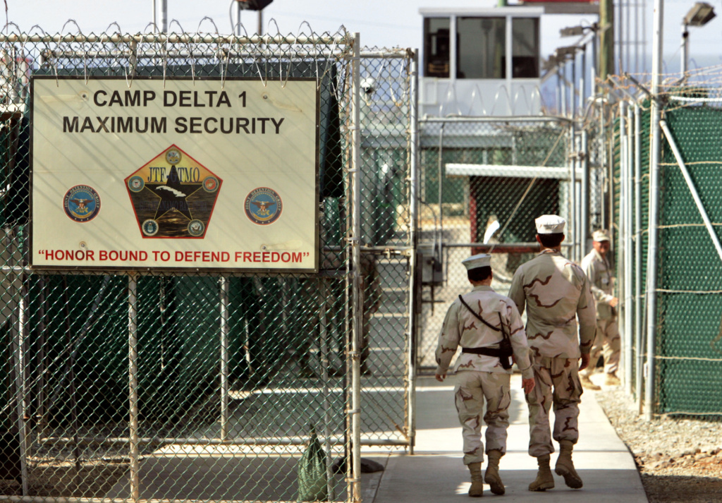 U.S. military guards walk within the Camp Delta military-run prison at the Guantanamo Bay US Naval Base, Cuba, in 2006. Wednesday marks 10 years since detainees first arrived at the detention facility. U.S. military guards walk within the Camp Delta military-run prison at the Guantanamo Bay US Naval Base, Cuba, in 2006. Wednesday marks 10 years since detainees first arrived at the detention facility.
