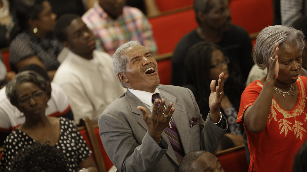 Mourners gathered at the Emanuel African Methodist Episcopal Church in Charleston, S.C. on Sunday. Mourners gathered at the Emanuel African Methodist Episcopal Church in Charleston, S.C. after June's deadly shooting.