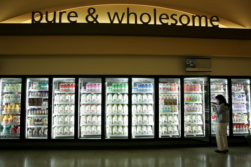 New Safeway Opens With Focus On Organic Goods A Safeway customer shops for milk at Safeway's new
