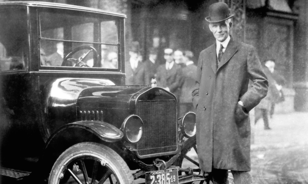 Henry Ford With 1921 Model T While other auto makers wanted to design luxury cars, Henry Ford designed a car that anyone could afford. Here he is standing by that very car. From the collections of The Henry Ford and Ford Motor Company.