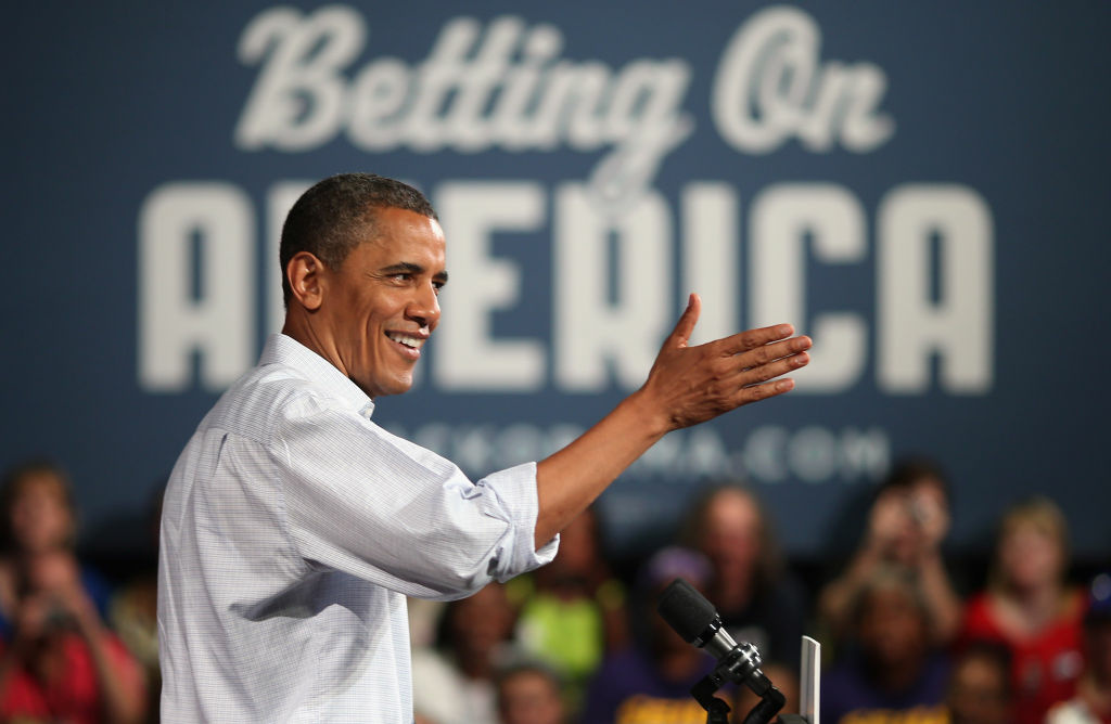Barack Obama Goes On 2-Day Campaign Swing In Ohio And Pennsylvania U.S. President Barack Obama speaks at a campaign event at Dobbins Elementary School July 5, 2012 in Poland, Ohio. This is the second day of Obama's ''Betting On America'' campaign through Northern Ohio and Western Pennsylvania by bus. The president highlighted his administration?s efforts to improve the economy by creating manufacturing jobs and rescuing the American auto industry and also taking swings at the presumptive Republican presidential nominee, former Governor of Massachusetts Mitt Romney.