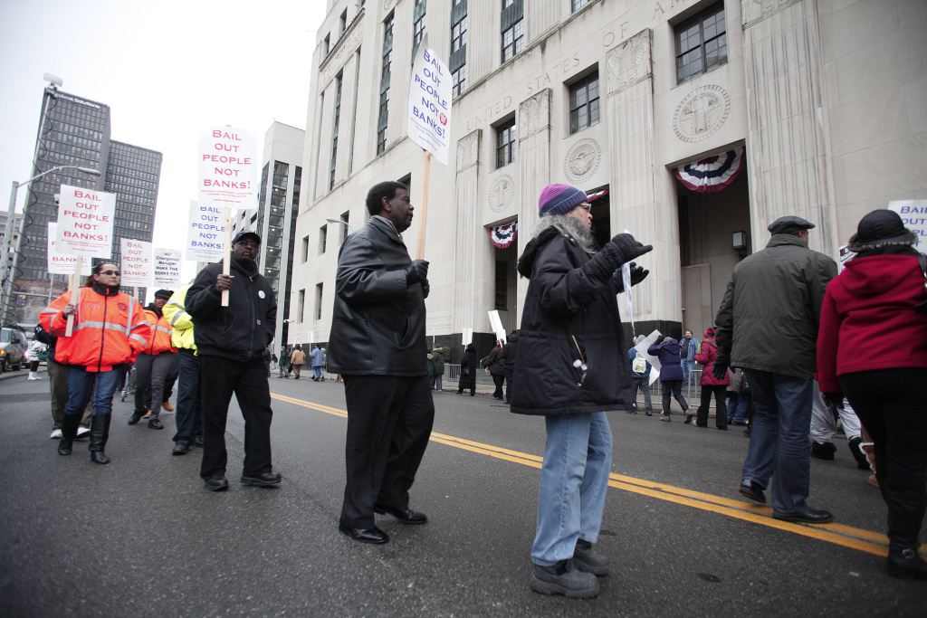 Federal Judge Rules On Detroit Bankruptcy Eligibility People protest outside the U.S. Courthouse where federal bankruptcy Judge Steven Rhodes is to rule on Detroit's Chapter 9 bankruptcy eligibility December 3, 2013 in Detroit, Michigan. Judge Rhodes ruled that the city is eligible for bankruptcy protection and that pensions can be cut. Detroit is the largest city in U.S. history to file for bankruptcy.