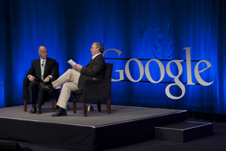Democratic California Gubernatorial candidate Jerry Brown (L) speaks to Eric Schmidt, Chairman and Chief Executive Officer of Google during a town hall meeting at Google headquarters on April 9, 2010 in Mountain View, California.