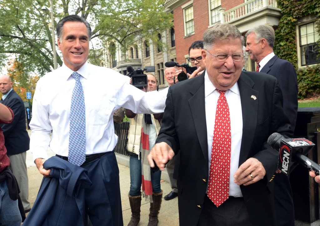 Romney Files Paperwork For NH Primary, Holds Rally CONCORD, NEW HAMPSHIRE- OCTOBER 24: Republican presidential candidate former Massachusetts Gov. Mitt Romney greets former New Hampshire Governor John Sununu (R) outside the New Hampshire Statehouse after filing the necessary paperwork to be on the New Hampshire primary ballot October 24, 2011 at in Concord, New Hampshire. Romney picked up the endorsement of the former Governor. (Photo by Darren McCollester/Getty Images)