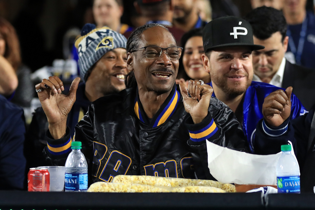 Wild Card Round - Atlanta Falcons v Los Angeles Rams LOS ANGELES, CA - JANUARY 06: Rapper Snoop Dogg attends the NFC Wild Card Playoff Game between the Los Angeles Rams and Atlanta Falcons at the Los Angeles Coliseum on January 6, 2018 in Los Angeles, California. (Photo by Sean M. Haffey/Getty Images)