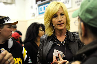 Advocate Erin Brockovich meets with Hinkley, Calif., residents during the Lahontan Regional Water Quality Control Board presentation earlier this month.