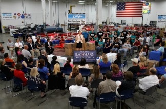 Mercer 20164 Republican presidential candidate Rep. Michele Bachmann (R-MN) (C) at Competitive Edge, an advertising and promotion product manufacturer, August 10, 2011; one of the many stops she's made all over Iowa before the straw poll Saturday.