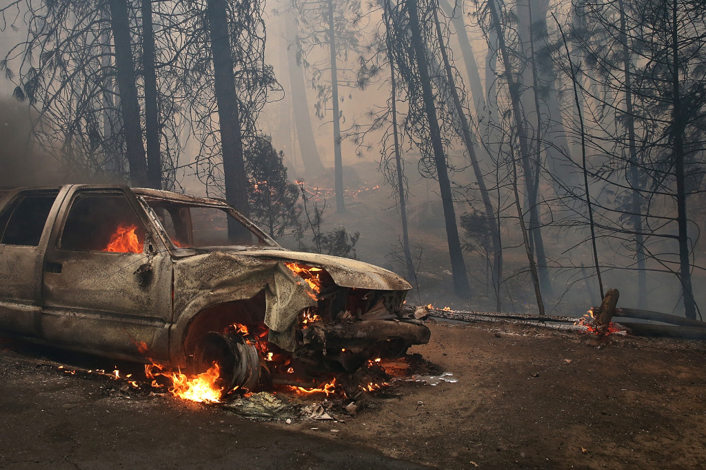 Rim Fire Continues To Burn Near Yosemite National Park A burned car sits on the side of the road after being consumed by the Rim Fire on August 25, 2013 near Groveland, California. The Rim Fire continues to burn out of control and threatens 4,500 homes outside of Yosemite National Park. Over 2,000 firefighters are battling the blaze that has entered a section of Yosemite National Park and is currently 7 percent contained.