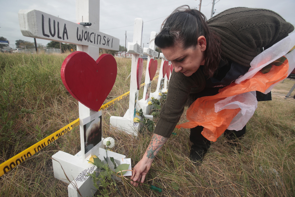 26 People Killed And 20 Injured After Mass Shooting At Texas Church Joyce Mires leaves flowers at a memorial where 26 crosses were placed to honor the 26 people killed at the First Baptist Church of Sutherland Springs on November 5, 2017 in Sutherland Springs, Texas.