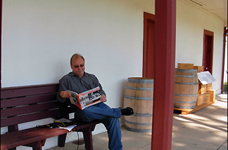 Mercer 7744 Kevin Roderick peruses his book The San Fernando Valley: America's Suburb , at Los Encinos State Historic Park.