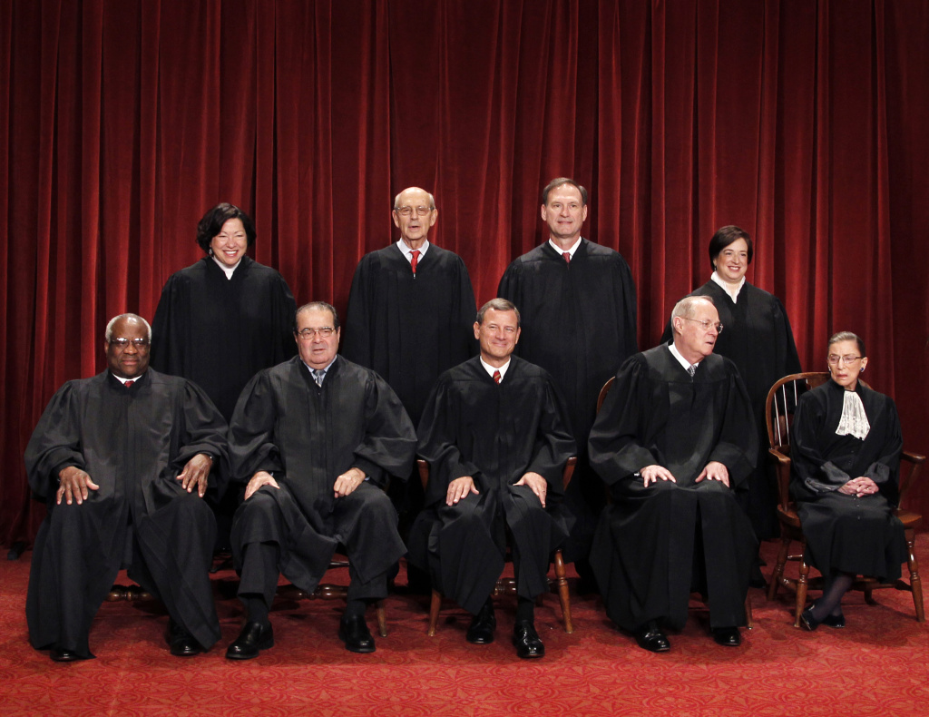 Obit Antonin Scalia The Supreme Court justices pose for a group photo at the Supreme Court in Washington in 2010. Seated, from left, are Justice Clarence Thomas, Justice Antonin Scalia, Chief Justice John Roberts, Justice Anthony Kennedy, and Justice Ruth Bader Ginsburg. Standing, from left, are Justices Sonia Sotomayor, Stephen Breyer, Samuel Alito Jr., and Elena Kagan.