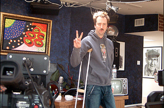 Mercer 7451 Tom Green in his home studio. He broke his leg doing a skateboard stunt.