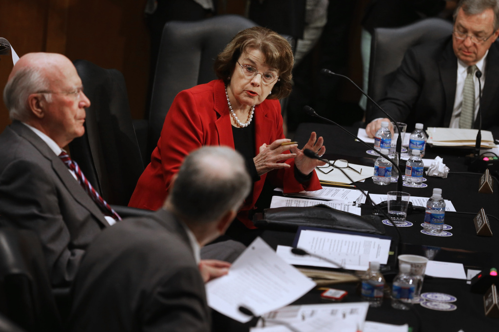 Senator Dianne Feinstein (D-CA) (L-R) Senate Judiciary Committee Chairman Patrick Leahy (D-VT), Sen. Charles Grassley (R-IA) (back to camera), Sen. Dianne Feinstein (D-CA) and Sen. Richard Durbin (D-IL) debate during a markup session for the immigration reform legislation now before the committee in the Hart Senate Office Building on Capitol Hill May 20, 2013 in Washington, DC. The Judiciary Committee is hoping to wrap up work on the landmark immigration reform bill this week after wading through the 300 amendments that were filed to the bipartisan bill.