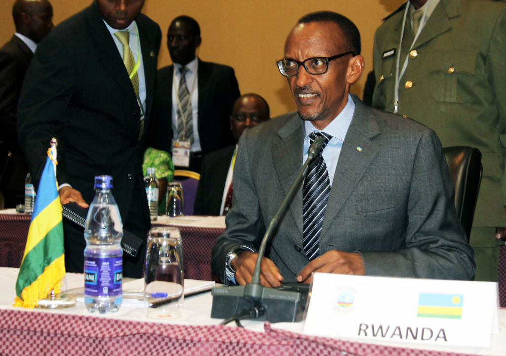 UGANDA-GREAT-LAKES-SUMMIT Rwanda's President Paul Kagame listens to proceedings during the International Conference of the Great Lakes Region (ICGLR) in Kampala on October 8, 2012. The Presidents and representatives of the Great Lakes Countries are meeting in Kampala to discuss the security situation in Eastern Democratic Republic of Congo (DRC).