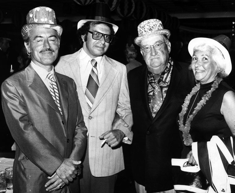 Why aren't Irish eyes -- Dodger owner Walter O'Malley, second from right -- smiling? Because that's Major League Baseball players rep Marvin Miller on the left, who had just polled players on whether they were going to call a strike. Photo taken 1972 at O'Malley's St Patrick's Day party. Why aren't Irish eyes -- Dodger owner Walter O'Malley, second from right -- smiling? Because that's Major League Baseball players rep Marvin Miller on the left, who had just polled players on whether they were going to call a strike. Photo taken 1972 at O'Malley's St Patrick's Day party.