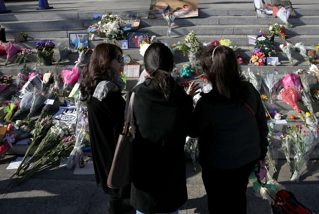 Memorial For Late San Francisco Mayor Ed Lee Continues To Grow Mourners stand in front of a makeshift memorial of flowers and pictures for former San Francisco mayor Ed Lee at San Francisco City Hall on December 14, 2017 in San Francisco, California.