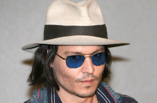 File photo: Johnny Depp arrives at the Narita International Airport for the Japanese premiere of 'Pirates Of The Caribbean: At World's End' May 22, 2007 in Narita, Japan. Disney said they have just begun filming "Pirates of the Caribbean: On Stranger Tides," the fourth installment of the "Pirates of the Caribbean" franchise. Depp returns to his leading role as Captain Jack Sparrow.